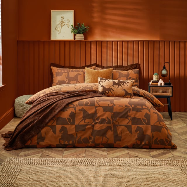 Inspired by the notion of wild horses galloping free in the desert, Herve draws from ancient ideas that painted running horses are meant to welcome good fortune, peace, and riches in the home. This design is reversible, with one side showing the horses in patchwork while the other depicts them running free, perfect for a midweek refresh.