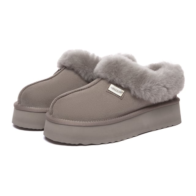Stay snug and stylish in the timeless Topknot Ankle Slippers, the latest essential footwear with a trendy platform design. Crafted in five chic colour options, these slippers envelop your feet in luxurious sheepskin wool, offering irresistible comfort. Complete with a fluffy wool ankle collar, their enduring charm ensures they remain in vogue across seasons.

Product No. EAU2017

Description:
- Cow Suede Upper
Sheepskin Wool Insole and Lining
- EVA Sole