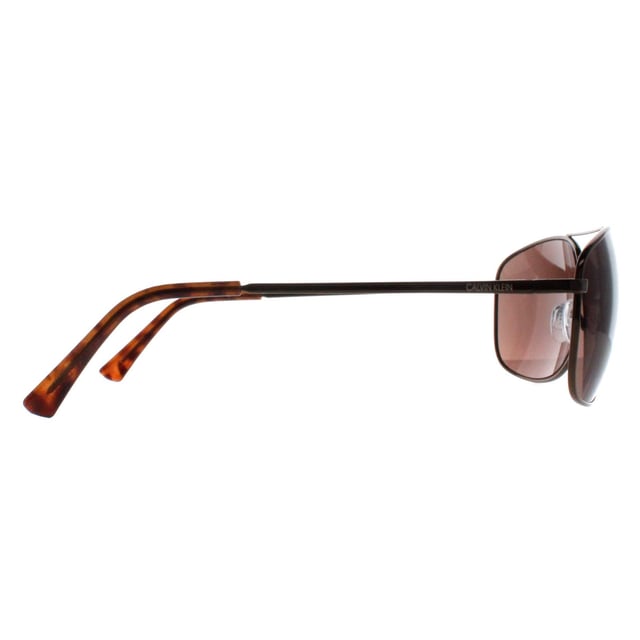Calvin Klein Rectangle Mens Brown Brown CK19137S  Sunglasses are a sleek and stylish accessory that blend modern design with classic sophistication. Featuring a rectangle frame crafted from lightweight yet durable acetate, these sunglasses offer both comfort and durability for daily wear. The design is minimalist, with clean lines and subtle branding on the temples, making them a versatile option for any outfit. The lenses provide UV protection, ensuring eye safety while maintaining a chic, high-fashion look.