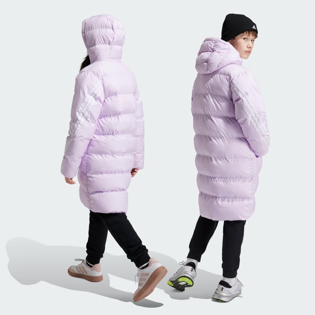 Made from sturdy ripstop and padded for warmth, this juniors' adidas jacket is your go-to during the colder months. Designed to keep the elements at bay without weighing you down, this long jacket offers plenty of coverage as you venture outdoors. A hood shields you from rain, while pockets keep your belongings tucked away. This product is made with 100% recycled materials. By reusing materials that have already been created, adidas help to reduce waste and our reliance on finite resources and reduce the footprint of the products adidas make.  - This model is 152 cm and wears a size 11-12Y. Their chest measures 70 cm and the waist 60 cm. - Regular fit - Full zip with hood - 100% polyester (recycled) - Front pockets - Self-fabric cuffs  Shipped by adidas