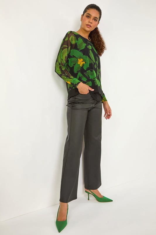 Floral Mesh Overlay Stretch Top from Roman. Make a standout statement this Autumn and Winter with this stunning printed mesh overlay top. Featuring an eye catching all over floral print, this top has a delicate mesh overlay with a soft jersey inner for comfort and style combined. The 3/4 sleeves and classic round neck make this piece a versatile and chic addition to your wardrobe. Pair with tailored trousers and heeled boots for a sophisticated look that's perfect for any occasion!