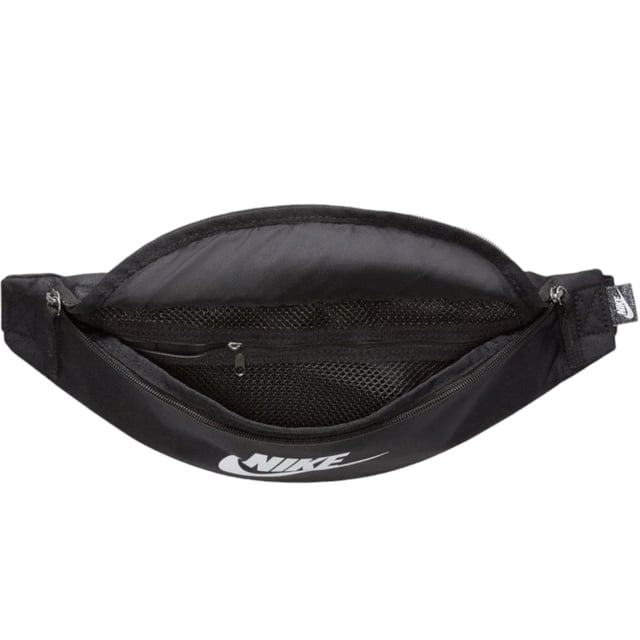 A comfortable and easy-to-adjust strap makes taking the Nike Heritage Waistpack on everyday trips a no-brainer. The main compartment provides secure storage for your phone, snacks or wallet, while the smaller accessories pocket on the back helps keep things like your keys or travel info safe and close at hand.
28cm L x 8cm W x 13cm H (approx)