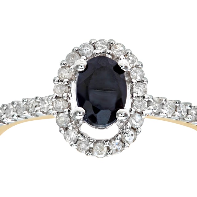 9K (375) geel goud: 2,4 gram; # Diamant: 0,23 ct; # Saffier: 0,85 ct