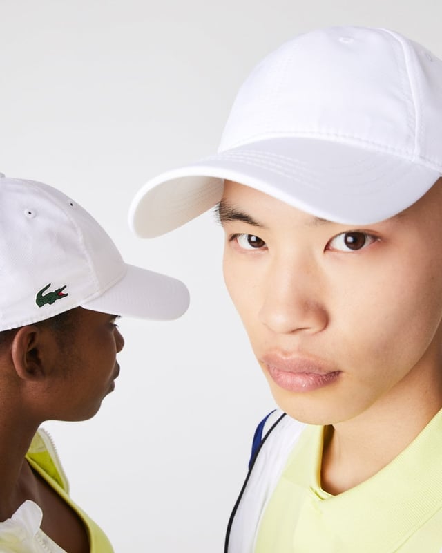 Simplicity and performance are the hallmarks of the lightweight solid-coloured taffeta Lacoste Sport cap. Featuring breathable eyelets and an adjustable strap in the back, this perfectly comfortable protective accessory is available in several modern shades. Wear it both in town and to practice.
Taffeta: Smooth, very light weaved fabric with a slightly shiny finishAdjustable strapBreathable eyeletsDecorative overstitchingGreen crocodile transfer on sideMain fabric: Polyester (100%) / Outer layer: Polyester (100%) / Inner layer: Polyester (100%) / Inner sweatband: Cotton (100%) / Front lining: Polyester (100%)
RK2662
 