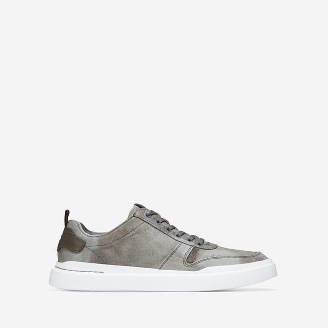 We've given our much-loved, signature GrandPro Rally Court Sneaker an update in organic canvas. Crafted from high-end-yet-durable materials, it features a luxuriously cushioned GRANDFOAM footbed, an EVA outsole, and a classic old-school sneaker vibe