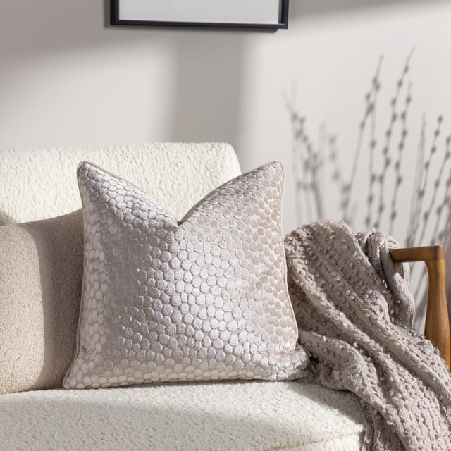 Add instant style and texture to any space with the Arvo throw. This woven design is adorned with elegant strands of vertical boucle yarn, which slide gracefully down the piece, until they meet the textural fringing at both ends. It comes in a range of muted, chic tones, which are inspired by modern neutrals and fashion fabrics. A simple, but polished throw to drape on your sofa or bed to add instant style and texture to your home.