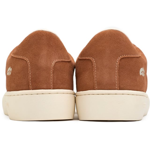 Step Up Your Eco-game With The Good News Slimer Trainers. Sporting A Sleek Tan Hue, These Court-inspired Kicks Boast A 100% Recycled Mesh Lining, Ensuring Your Steps Tread Lightly On The Planet. Crafted With Breathable, Cushioned Footbeds And A Unique Round-toe Shape, They Offer Unmatched Comfort. The 100% Copper Eyelets Add A Refined Touch, While The Robust Rubber Soles Promise Enduring Style. Stride With Pride In These Sustainable Standouts That Don't Compromise On Looks Or Values.