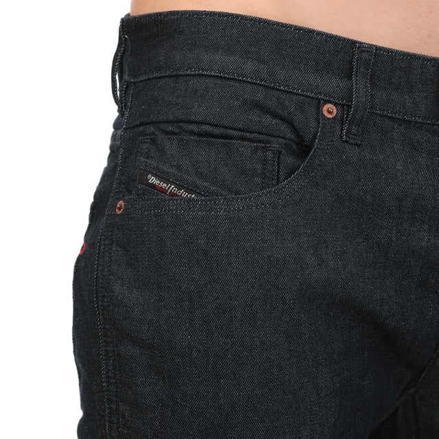 Mens Diesel D-Fining Tapered Jeans in denim.- Classic 5 pocket styling.- Button fly fastening.- Belt loops.- Branded strip across small pocket.- Diesel branding.- Tapered leg fit.- 53% Lyocell  40% Cotton  6% Polyester  1% Elastane.- Ref: A01704009HF01