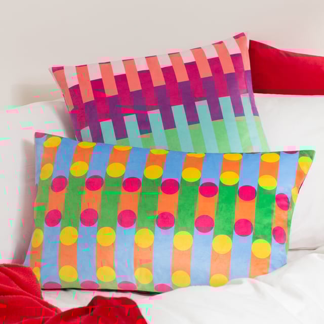 Dopamine Decor is an interior design and furniture collection designed to make you happy! Place this cushion on your sofa to make it stand out with its eye-catching design of retro circles and stripes in bright, trendy tones, which fuse together to produce an explosion of vibrant colour. The perfect way to inject some personality into your living space. Size: 40 x 60cm