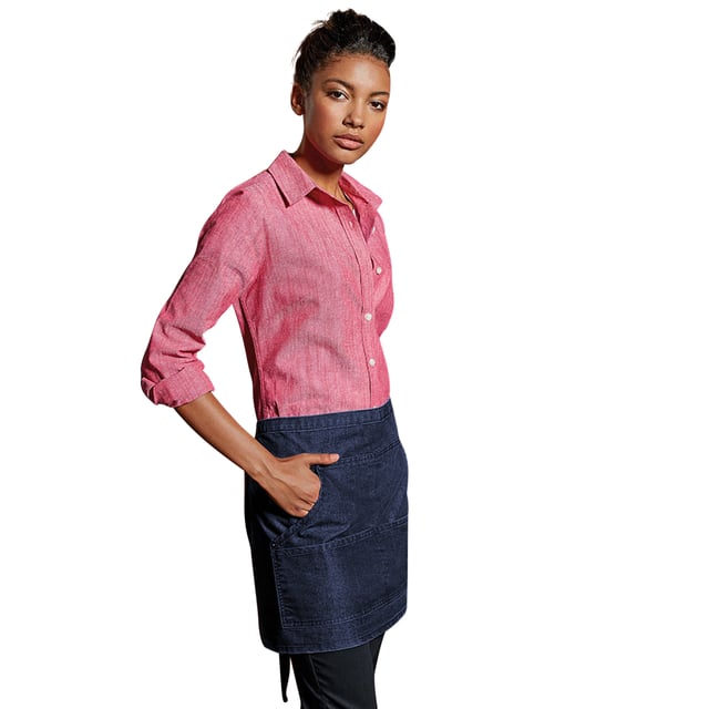 Denim waist apron with contrast stitching. Copper rivets. Four pocket compartments. 106cm self fabric ties. Length of apron is 39.5 cm and width 79cm. Washing Instructions Domestic wash 60c, Industrial laundry 85c. Fabric 70% Cotton, 30% Polyester twill.