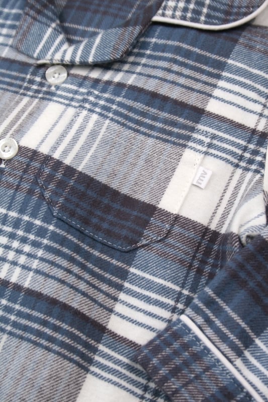 Give your little one a cosy, stylish sleep with our Boys' Traditional Check Cotton Pyjama Set, crafted for comfort and classic appeal. Featuring a timeless checkered pattern, this two-piece pyjama set includes a button-up top with a relaxed fit and elastic-waist bottoms, ensuring easy movement and a snug fit. Made from soft, breathable cotton fabric,  these PJs are designed to keep your child comfortable through every season.
Ideal for parents seeking classic boys' sleepwear or a check pyjama set, this outfit combines heritage charm with modern ease. Perfect for bedtime, lounging, or even as a thoughtful gift, this boys' check PJ set offers durability, comfort, and style in one package.