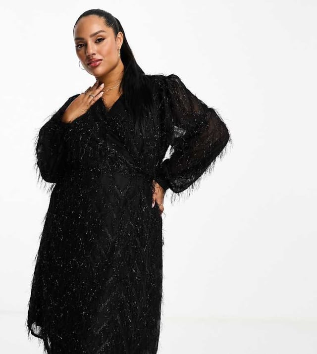 Dresses by Vila Curve Dress the part Textured finish Wrap front Volume sleeves Regular fitSold By: Asos