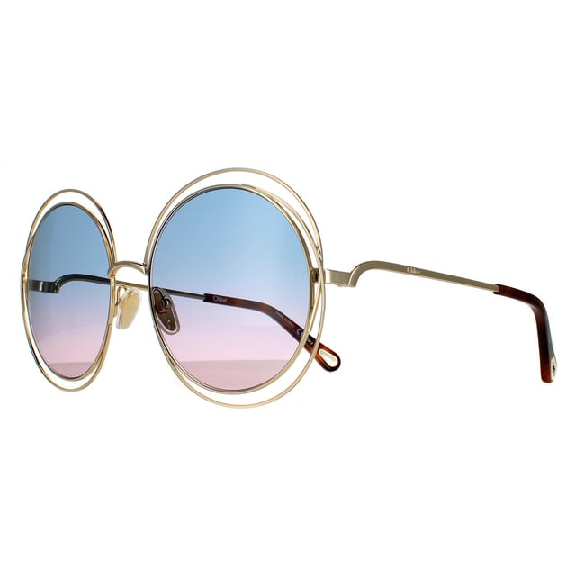 Chloe Round Womens Goudblauw roze gradiënt Ch0045S Zonnebril zijn een oversized ronde stijl met een sculpturaal bekabeld frame, siliconenneuspoten en tempels geëtst met het Chloe -logo.