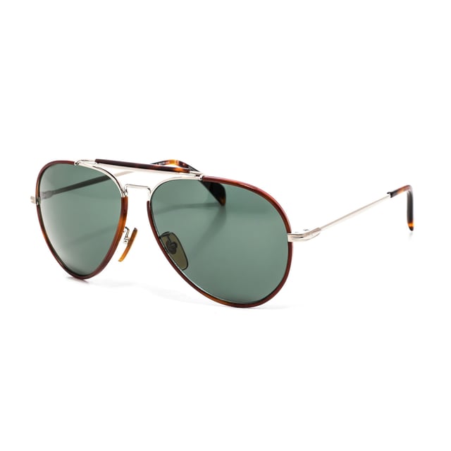 7003S sunglasses with acetate and metal frame

 Shape and design:
 - These David Beckham glasses have an aviator silhouette.

 Frame material:
 - The frame of these glasses is made of acetate, a plastic material.
 - Acetate provides durability, flexibility and a smooth finish to the frame.

 Metal temples:
 - The temples are also made of metal.
 - The metal on the temples adds solidity and stability to the structure of the glasses.

 Glasses:
 - The lenses are of high quality.
 - These lenses provide excellent UV protection and sharp, clear vision.
 Measures: Lens height: 53 mm. Lens width: 51 mm. Bridge: 13 mm. Temples: 140 mm.
 Composition: Acetate
 Care:
Use a soft, clean microfiber cloth to clean your sunglasses. This type of cloth will not scratch the lenses.
 Avoid using abrasive cleaning products, detergents, alcohol or acetone, as they can damage lenses and anti-reflective treatments.