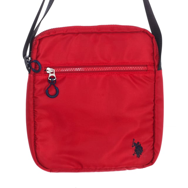 Men's shoulder bag from the U.S. POLO ASSN brand.
 Synthetic material exterior.
 Top zipper closure.
 Front exterior: One pocket with zipper closure.
 Rear exterior: One pocket with zipper closure
 Front interior: One pocket with zipper closure.
 Back interior: One open pocket.
 Adjustable strap with brand print.
 Brand logo on the front.
 Measures: 25x29x4cm
 Composition: 100% Nylon
 Care:
Clean with a wet cloth.