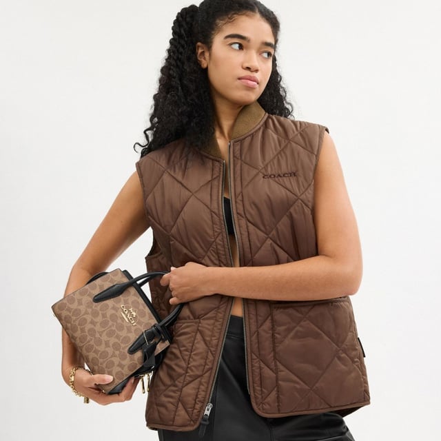 Andrea Carryall in Signature Canvas, Four protective feet at base, Inside multifunction pocket,  Length: 22.00 cm,  Width: 11.50 cm,  Height: 16.50 cm