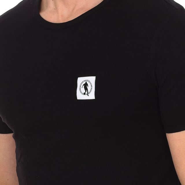 Bikkembergs short sleeve t-shirt.
 Color Black
 Round neck with ribbed finish.
 Fabric label personalized by the brand, on the upper side.
 Comfortable and breathable fabric.
 Seams seen in tone.

 Composition: 95% Cotton, 5% Elastane

 Care:
 -Wash at max temperature. 40ºC.
 -Do not use bleach.
 -Supports dry cleaning.
 -Allows you to use dryer.
 -Iron at max temperature. 130ºC.
 Composition: 95% Cotton, 5% Elastane
 Care:
Care:
 -Wash at max temperature. 40ºC.
 -Do not use bleach.
 -Supports dry cleaning.
 -Allows you to use a dryer.
 -Iron at max temperature. 130ºC.