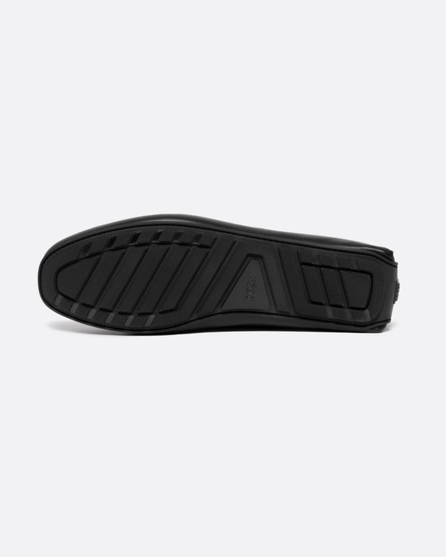 Easy-wear moccasins in nappa leather with a TPU driver outsole featuring signature details by BOSS.
Fastening top: Slip-onFully linedPackaging: Box
90% Polyamid, 10% Polyurethane, Sole: 100% Thermoplastic polyurethane, Upper material: 100% Cow skin, Innersole: 90% Polyamid, 10% Polyurethane
 
50517134
 