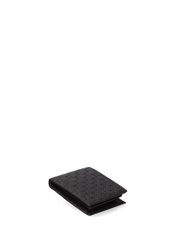 Cartera de hombre. El cierre está ausente. Los bolsillos internos son tarjeteros. Los bolsillos externos están ausentes. Falta la correa para el hombro. Falta el mango. Hay un compartimento interno. El material exterior es 100% Piel Auténtica. Internamente no está forrado. Medidas: 11x9x2 cm. Producto de moda