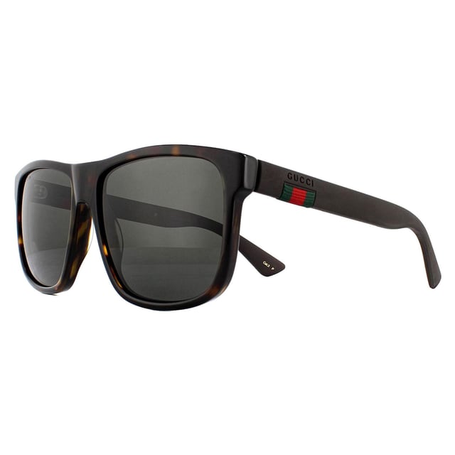 Gucci Sunglasses GG0010S 003 Havana and Grey Grey Polarized are a sophisticated lightweight D-frame model with bi-chromatic styling. The frame is an easy to wear shape that suits the majority of face shapes and is completed by Gucci's distinctive red and green brand logo..