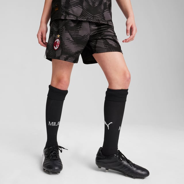 PUMA Boys AC Milan 24/25 Goalkeeper Shorts PRODUCT STORY: Stand between the posts like a Rossoneri legend in these official AC Milan Goalkeeper Shorts. Built for the intensity of match day they feature dryCELL tech to wick sweat and keep you feeling cool, comfortable and focused. FEATURES & BENEFITS: dryCELL: Performance technology designed to wick moisture from the body and keep you free of sweat during exercise; As part of the RE:FIBRE program, this garment is made of at least 95% recycled material from textile waste and other used materials. DETAILS: Regular fit; 170 gsm, Jacquard; Medium rise; Official team branding; PUMA branding details; PUMA Youth: Recommended for older kids between 8 and 16 years. Our model is 150 cm tall and is wearing size 152 RUS.