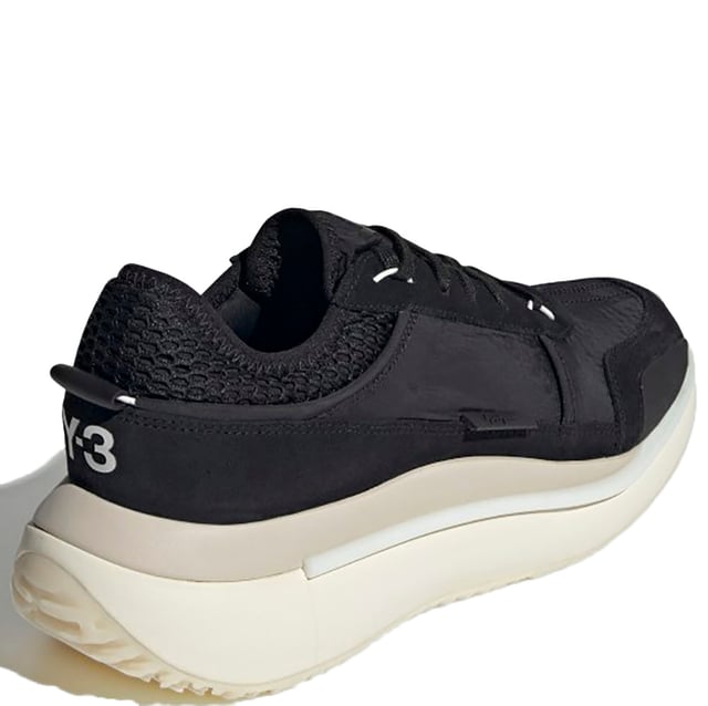 Mens Y-3 Ajatu Run Trainers in black cream.- Suede  double-layer textile and mesh upper.- Lace closure.- Lightstrike cushioning.- Collapsible feel.- Suede and mesh lining.- Rubber outsole.- Ref: GW8613