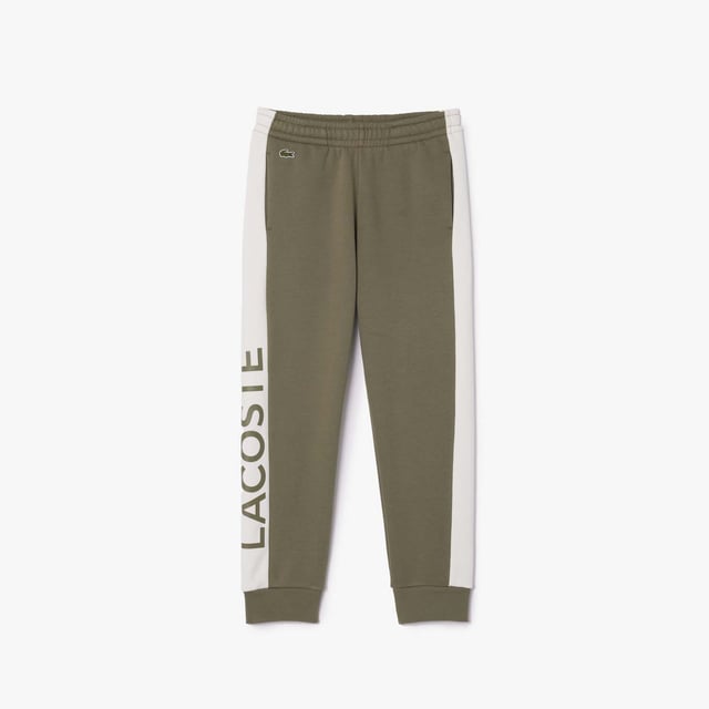 Kids’ Lacoste Organic Cotton and Recycled Polyester Track Pants Elasticated waistband Contrast bands Branding on side Embroidered crocodile Organic cotton flannel Kids’ Lacoste Organic Cotton and Recycled Polyester Track Pants Elasticated waistband Contrast bands Branding on side Embroidered crocodile Organic cotton flannel