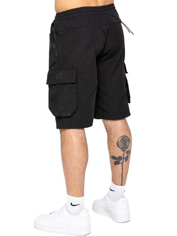 Expertly designed with top-quality ripstop fabric, these Enzo technical cargo shorts offer unparalleled durability. The convenient cargo pockets and zip side pockets make for easy storage, and the elasticated waistband with an adjustable drawstring ensures a comfortable fit. Upgrade your wardrobe and gear with this must-have for any outdoor enthusiast.