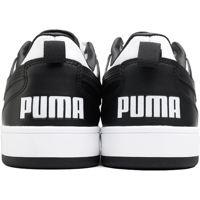 Lace Up And Power Your Stride With The Puma Dribble Court Trainers. These Retro-inspired Kicks Feature A Synthetic Leather Upper With The Iconic Puma Branding. The Padded Collar And Comfort Insole Cushion Your Every Step, While The Grippy Rubber Outsole Handles The Blacktop Like A Pro. Whether Playing A Pick-up Game Or Just Looking The Part, These Classic Black And White Trainers Have You Dribbling In Style.