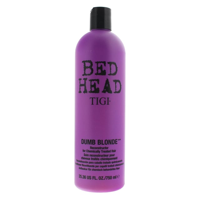 Tigi Bed Head Dumb Blonde Conditioner is a conditioner that has been designed to leave hair feeling revived and nourished. The conditioner is packed with proteins which helps to balance the pH of the hair and deeply penetrates the hair to inject hydration and strength. The conditioner is intense but but the formula is lightweight and delicate to fragile hair, protecting it, thickening it and repairing it. The formula contains Keratin amino acids, soybean protein and pro Vitamin B5, which work to moisturise, repair and condition the hair.