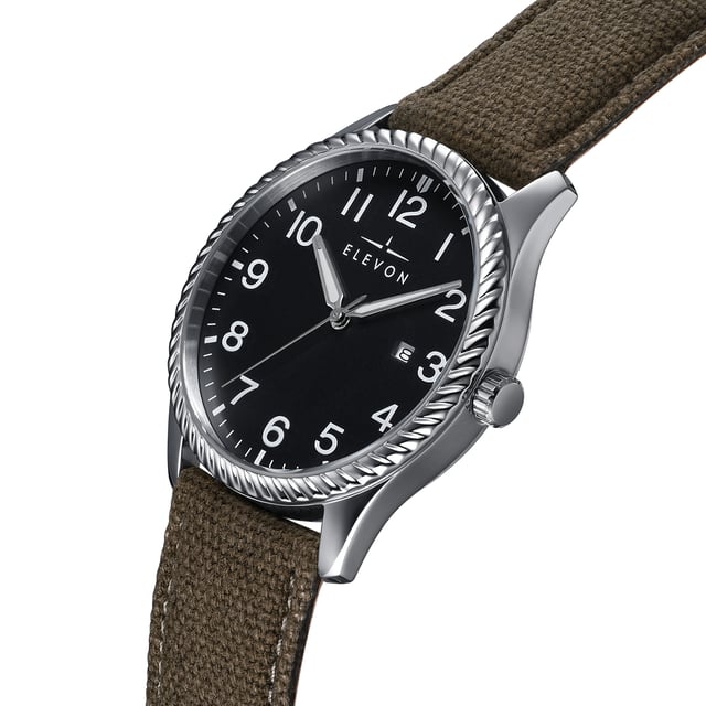 Polished Alloy Case
Japanese Seiko PC21 Quartz Movement
Non-Glare Scratch-Resistant Mineral Crystal
Logo-Engraved Stainless Steel Caseback
Canvas-Overlaid Genuine-Leather Strap
Logo-Engraved Stainless Steel Clasp
Luminous Hands
Date Display
42mm Case Diameter
5ATM Water Resistance