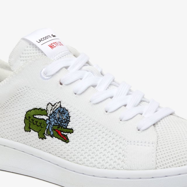 A casual style inspired by Lacoste’s tennis heritage  the Carnaby sneakers are imagined in a piqué texture with breathable lining and an embroidered crocodile to the side. Classic and easy to wear  the low-top style pairs best with shorts or jeans. - Court shoes - Textile uppers - Textile lining - Printed and debossed Lacoste branding to tongue and heel - Embroidered crocodile to side - Exposed stitching to outsoles - Rubber outsoles - Ref: 745SFA00951T3