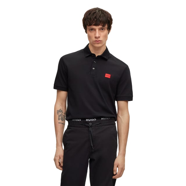 Men's polo shirt from the HUGO brand. Plain-coloured pique polo with woven label on the left chest. Made of pure cotton.