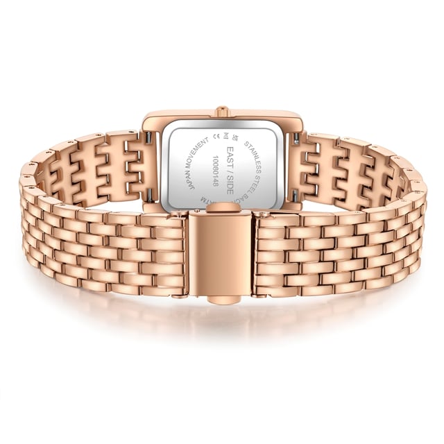 GENERAL INFORMATION:  • Targetgroup: Female  • Wristwatch: No Special Functions  • Display: analogue  • Weight of watch w/o box (gr.) - approx.: 55,0  MOVEMENT:  • Movement: Quartz  • Term of Movement: 2035  • Origin of movement: Japan  BRACELET:  • Material of bracelet/strap: Metal (Alloy)  • Plating of bracelet/strap: Ion-Plating (IP)  • Finishing of bracelet/strap: Smooth  • Finishing/Decoration of bracelet/strap: None  • Clasp/Closure/Buckle: Security-folding clasp  • Color of bracelet/strap: Rosegold  • Length of bracelet/strap (mm) approx.: 210,0  • Width of bracelet/strap (mm) approx.: 13,4  • Style/Design of bracelet/strap: Link bracelet  • Bracelet/strap adjustable?: No  CASE:  • Shape of case: Rectangular  • Size/Diameter of case in mm . approx.: 20,5 x 30,8  • Height of case in mm: 8,4  • Case material: Metal (Alloy)  • Surface of case: Polished  • Bezel/Topring: Fixed  • Finishing/Decoration of case: None  • Material of case back: Stainless steel  • Lock of case back: No screwed-in crown  • Color of case: Rosegold  • Coating/Plating (Case): Ion-Plating (IP)  • Type/Form of crystal: Flat  • Material of crystal: Mineral crystal  DIAL:  • Size jewelry care cloth: Hour, Minute, Second  • Indices: Roman numerals/points  • Material of dial: Brass  • Structure/pattern of dial: Flat/sunray  • Color of dial: Blue  PUSHER, CROWN, HAND:  • Pusher: None  • Corrector: No  • Crown: No screwed-in crown  • Type of hands: Dauphine hands  • Luminescent (hands): No  PACKAGING & SCOPE OF DELIVERY:  • Box: Yes  • Service booklet: Yes  • Manual: Yes