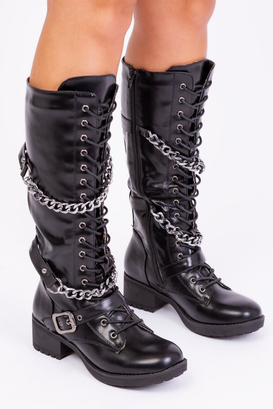 Women's lace up boot with front buckle and silver chain detail