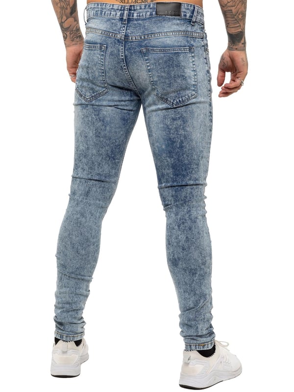 Enzo Mens Skinny Stretch rasgó los jeans angustiados. Efecto de rasgadura y reparación, cierre de mosca Zip. Dos bolsillos delanteros, dos bolsillos traseros, bolsillo de una sola moneda. Remaches y botones de marca.