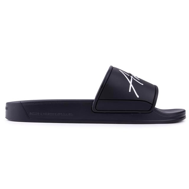 Sea fresco e informal en la piscina. en la playa o mientras descansa. con estas chanclas negras para hombre de Android Homme Laguna Beach. Esta sandalia de diseño presenta una correa ancha con la marca y una plantilla moldeada. Relájate con estilo. de vacaciones o en casa.