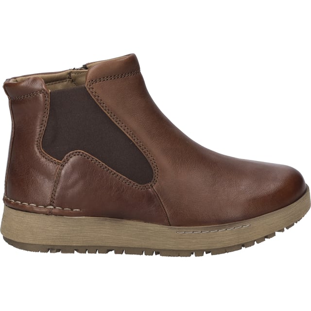 Discover the essence of cosiness and sustainable fashion with the Anna 04 ankle boot in castagne by JOSEF SEIBEL. A pair of shoes specially designed for women to enjoy everyday life to the full. This model exudes traditional charm and modern design with its smooth goatskin leather, a warm textile lining and a Rubflex sole, which is known for its flexibility, pliability and durability. The Anna 04 is more than just an ankle boot; it is a statement for those who prioritise comfort without compromising on style and quality. Equipped with a practical zip fastening, they offer easy entry and a perfect fit for wider feet thanks to the comfortable width H. The removable insole allows you to insert your own orthopaedic footbed, making them even more comfortable to wear. The upper is joined to the outer midsole combination using the traditional Strobel technique, which gives the shoe a special stability and makes it ideal for outdoor activities. Whether for walks in the countryside, on the way to work or meeting up with friends, the Anna 04 ankle boot is the perfect companion for every occasion. With its classic yet strong character and membership of the Spirit of Nature product line, it embodies the JOSEF SEIBEL philosophy: style paired with exceptional comfort and a strong commitment to slow fashion, far removed from the fast pace of the fashion industry. This shoe is a tribute to the craftsmanship and heritage of JOSEF SEIBEL, designed to stand the test of time while remaining comfortable and stylish.