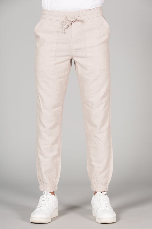 Upgrade your wardrobe with these linen trousers from Tokyo Laundry, featuring a classic fit and drawstring waist for added comfort. Made from a breathable blend of linen and cotton, these trousers are perfect for both casual and formal occasions. Machine washable for easy care, they are a versatile addition to any wardrobe.