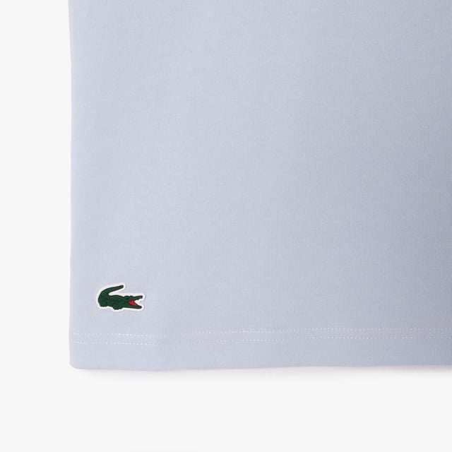 Men's Lacoste Sport Ultra-Dry Croc Print T-shirt.- Technical jersey.- Regular fit, straight cut.- Crew neck.- Print on front.- Silicone crocodile on front. Material: 65% Cotton, 35% Polyester. Ref: TH7513IL4.