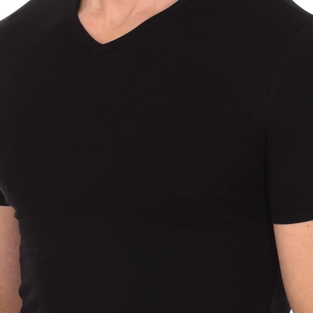 Bikkembergs short sleeve t-shirt.
 V-neck with ribbed finish.
 Fabric label personalized by the brand on the back of the neck.
 Comfortable and breathable fabric.
 Seams seen in tone.
 Composition: 95% Cotton, 5% Elastane
 Care:
Care:
 -Wash at max temperature. 40ºC.
 -Do not use bleach.
 -Supports dry cleaning.
 -Allows you to use a dryer.
 -Iron at max temperature. 130ºC.