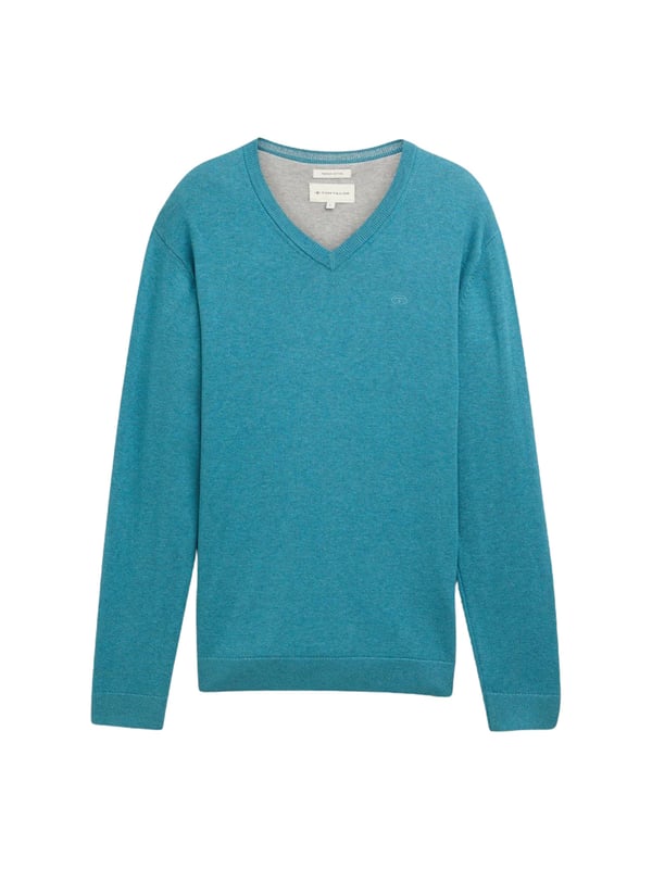 De gebreide herentrui van Tom Tailor biedt een klassieke maar stijlvolle look. Hij wordt gekenmerkt door een normale pasvorm, die zorgt voor een comfortabele pasvorm die niet te strak of te los zit. De V-hals geeft de trui een elegante touch die perfect is voor formele gelegenheden of alledaagse kantoorkleding, maar ook casual gedragen kan worden. De trui heeft lange mouwen en is gemaakt van hoogwaardig, gebreid materiaal dat je niet alleen warm houdt, maar ook aangenaam zacht is tegen de huid. Dankzij de hoogwaardige materialen is de trui zeer comfortabel om te dragen en behoudt hij zijn vorm, zelfs na vele wasbeurten. Deze gebreide trui is veelzijdig, zowel voor dagelijks gebruik als voor speciale gelegenheden, en past perfect bij jeans of chino's. Een must-have voor mannen die kwaliteit en tijdloos design belangrijk vinden.