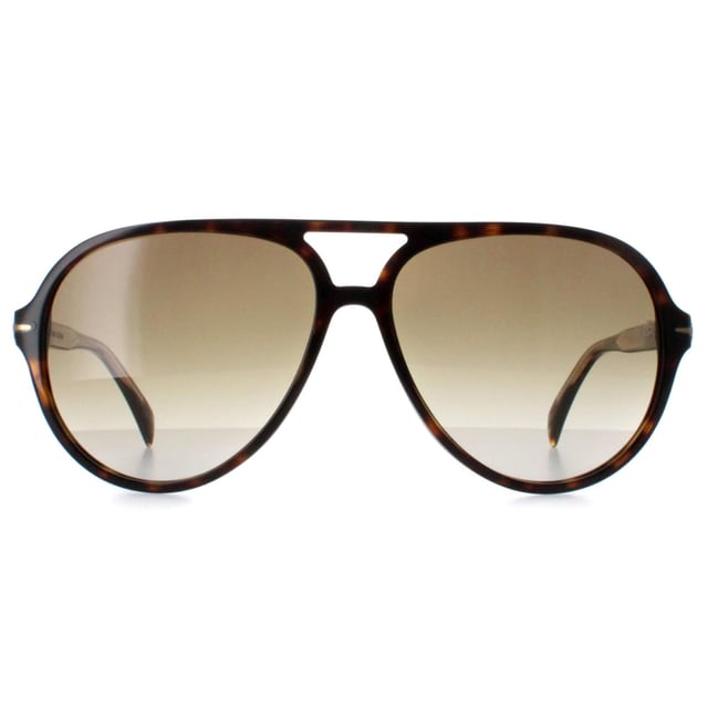 David Beckham Aviator Mens Havana Brown Gradient DB1091/S  Sunglasses are where impeccable style meets unparalleled functionality. Crafted with meticulous attention to detail, these sunglasses boast a modern yet timeless design that effortlessly captures Beckham's iconic flair. The sleek and lightweight frame is complemented by striking lenses, offering both protection from harmful UV rays and a touch of bold sophistication. Whether you're strolling through the city streets or lounging poolside, the sunglasses elevate any ensemble with a dash of Beckham's signature charm and charisma.