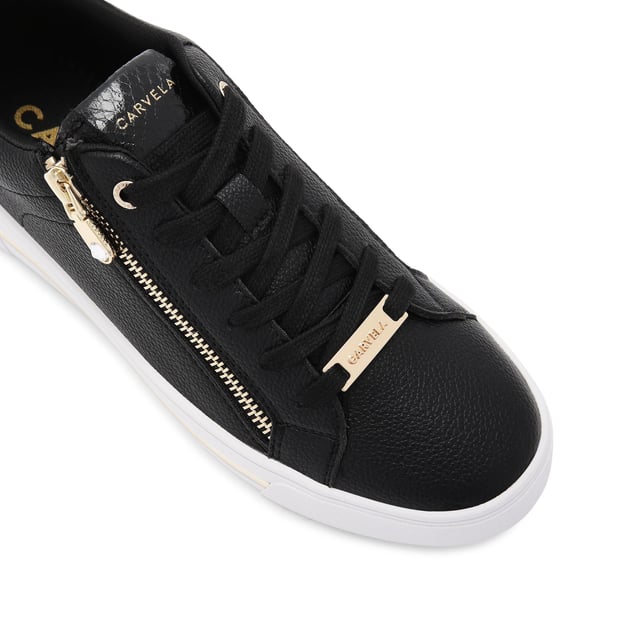The Carvela Diamond Zip trainer features a black upper with multiple textures. The front laces up with gold tone tabs across the lace up front and foil embossed branding on the tongue.
