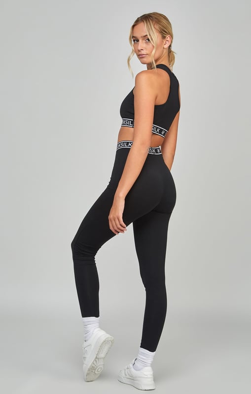 inchBlack Essential Tape BraletteSoft touchCropped fitTaped20% recycled cottonRacerbackTape hemMachine wash92% Cotton  8% Elastane inch