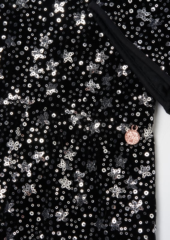 Little trendsetters - behold the party outfit of the season! Sequin stars adorn this cute playsuit and bring the party to your wardrobe. Wear with tights and chunky boots for maximum style credits.