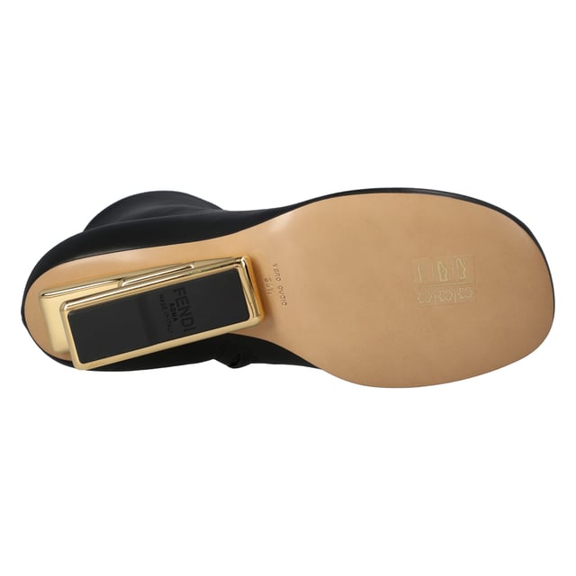 100% Calf Leather 
Made in Italy 
High diagonal F-shaped heel in gold-colored metal.
Heel height: 9.5 cm.
Rounded toe.Measurments:  height: 95 mm