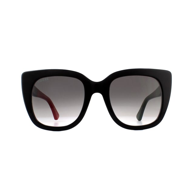 Gucci Sunglasses GG0163S 003 Black with Red and Green Brown Gradient are a sophisticated square cat eye style crafted from thick acetate. Temples feature the Gucci interlocking GG logo as well as the bumblebee motif at the temple tips.