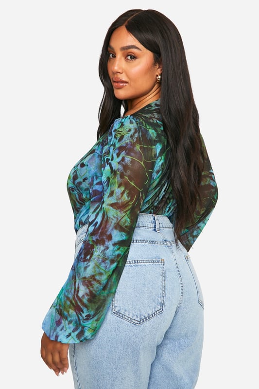 Plus Animal Wrap Mesh Bodysuit Update your wardrobe with this plus size bodysuit from our dedicated curve range. A form fitting, curve enhancing style with a press-stud fastening, this piece can be dressed up or down, depending on the vibe. Team with coated jeans and statement heels for date night plans, or pair with tailored trousers for a brunch date with your bestie. For an instant fresh 'fit, a plus size black bodysuit is perfect to replace your go-to t shirts. Got a date night planned? Team a dreamy plus size lace bodysuit with a leather skirt and standout heels.Style: BodysuitDesign: AnimalSleeve Length: Long Sleeve