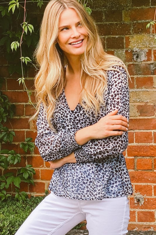 REASONS TO BUY: It'll transform your jeans and trousersYour new animal print fixFaux wrap front won't fall openOn-trend shirred waist: it's super-flatteringSexy sheer sleevesJust add white skinnies.